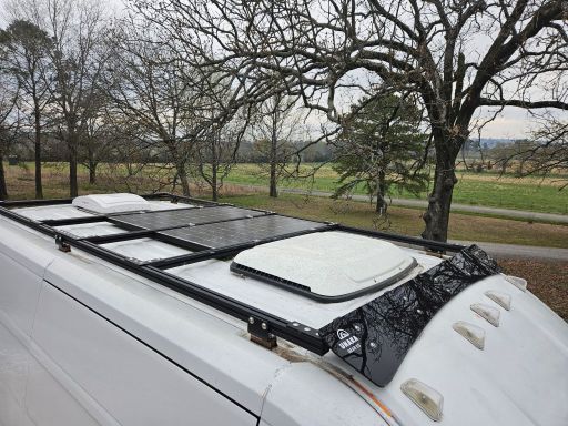 2016 Promaster 1500 136WB Roof 01 -Front angle- Unaka Rack, Fresair, Solar Panels, and MaxxFan